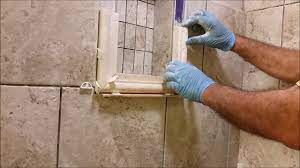 A bullnose is the most widely available trim piece. How To Install A Shower Niche Frame Using Traventine Chair Rail Pencil Trim Youtube