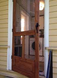 This easy to follow plan shows how to build a wooden screen door which can be customized to fit any door opening. The Story Of A 1925 Craftsman Cottage In Mississippi Wooden Screen Door Craftsman Cottage Wood Screen Door
