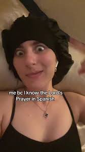 Woman Praying in Spanish