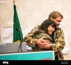 Marie Gluesenkamp Perez, left, hugs her husband Dean Gluesenkamp after  delivering a speech to supporters at the Clark County Democrats election  night watch party at a hotel in Vancouver, Wash., Tuesday, Nov.