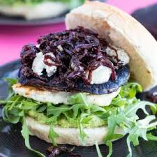 A hearty burger packed with nutty, melty grueyere, deeply browned mushrooms and onions simmered in a red wine reduction, and crisp, bittersweet radicchio. Portobello Mushroom Burgers With Halloumi Caramelized Onions