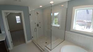 The bowl style bathtub compliments the large walk in shower built into a corner surrounded only by crystal clear glass panels. Glass Shower Doors Enclosures Clear View Industries Inc