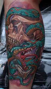A coiled snake tattoo shows the world that you have a deadly persona lurking underneath your seemingly composed and collected exterior. 16 Captivating Snake Tattoos Leg Tattoos Leg Tattoo Men Snake Tattoo Design