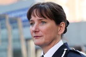 Top police officer credits her rise to him indoors