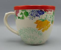 Covered in the pioneer woman's signature flowers, whoever gets this can expect to receive a lot of compliments on this slow cooker — and the mashed potatoes she makes inside it! White W Red Rim And Flowers The Pioneer Woman Country Garden Mug Coffee Mug Kc S Attic