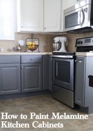 It has wooden kitchen cabinets that have been painted from the looks of them alot of times. Painting Melamine Kitchen Cabinets The Decorologist