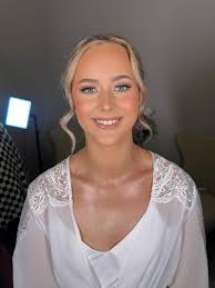 Natalie Holcomb -Top Knot Beauty Lounge