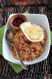 Over medium high heat, saute chicken rice aromatics in butter: Nasi Goreng Indonesian Fried Rice Rasa Malaysia