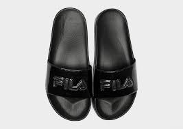 Die damen slides sind schlicht in schwarz gehalten und wirken elegant durch ihre außen mit steinen besetzten sohlen. Fila Drifter Slides Damen Schwarz Jd Sports