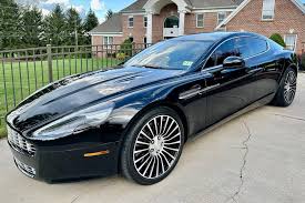 Image result for Jet Black 2012 Aston Martin