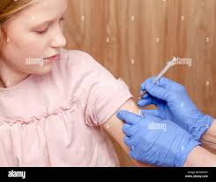 Vaccination child school hi-res stock photography and images