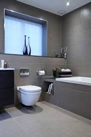 For the cabinetry, oak laminates on marine plywood was used. 10 Inspirational Examples Of Gray And White Bathrooms