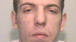 Police search for wanted robber