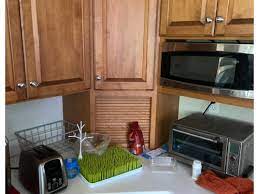 Removing clutter will help you make your garage function as it should be and that is to keep your vehicle safe. Upper Cabinet Removal Reinstall Appliance Garage Question