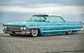 Image result for Dresden Blue 1961 Cadillac