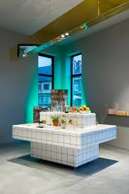 Zware Jongens Abandons Clinical White To Create Welcoming Open Plan Pharmacy In Belgium Retail Design Pharmacy Design Retail Interior