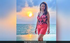 Happy to keep in touch! Pic Madhuri Dixit S Smile Is As Bright As The Maldives Sun
