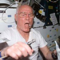 From Space to the Super Bowl Members of the STS-129 shuttle mission present  a specially minted silver medallion to National Football League officials 