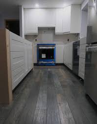 It seems that the ikea cabinets are meant to use over finished flooring, on feet, covered/hidden by a toe kick. Kitchen Update Ikea Cabinet Installation Chapter 2 The Homestud