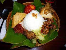 Nasi Uduk Indonesian Food The Meal Revolves Around Rice Cooked In Coconut Milk And Includes A Pinwheel Of Various Meat And Vegetable Accoutrements It Masakan