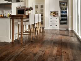 I like the idea of the flooring running under the cabinets as. 20 Beautiful Kitchens With Wood Laminate Flooring