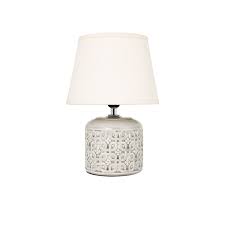 We love the textured baubles in a geometric trellis pattern on the base, adding a boho vibe to an Vichy Ceramic Table Lamp Home Store More