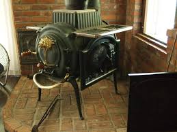 I Love These Elm Wood Stoves Just Waiting For A Used One To Come Up For Sale Locally The Tree On Gla Wood Stove Wood Stoves For Sale Wood Stove