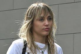 4, keeping her blonde hair back in a casual bun. Miley Cyrus Serves Angsty Teen Realness In A Tuxedo Vest Sneakers Fitforhealth News