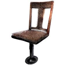 Chair Of Nails The Worlds Most Uncomfortable Chair Brown Leather Recliner Chair Chair World Market Dining Chairs