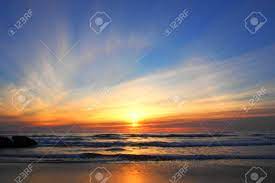 Listen to halo sunset | soundcloud is an audio platform that lets you listen to what you love and share the sounds you stream tracks and playlists from halo sunset on your desktop or mobile device. Sunset Halo At Piha Beach Stock Photo Picture And Royalty Free Image Image 90424356