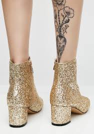 They also come in pink and silvery blue hues. Heeled Glitter Gold Ankle Boots Dolls Kill