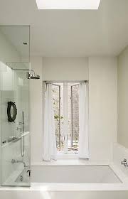 While i think they are a huge waste of space (especially in new york city). Traditional Bathroom Tub Shower Combo Shower Tub Tub Remodel