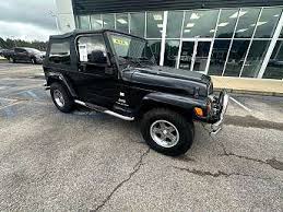 Image result for Brilliant Black 2005 Jeep