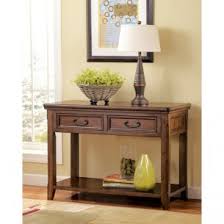 The woodboro cocktail, 2 end tables, and sofa table: Woodboro Lift Top Coffee Table Bernie Phyl S Furniture By Ashley Furniture