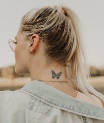 Pin Em Borboletas Tatuagem de borboleta com flor de lotus na costa. pin em borboletas