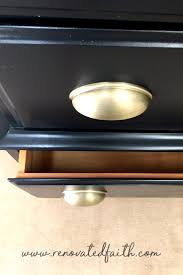 Simple curved handle pulls added a modern edge to this dresser chest. My Best Tips For Painting Furniture Black Dresser Reveal