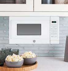How to hang a microwave under a cabinet. Ge Compact Microwave Oven Jem3072dh Ada Appliances