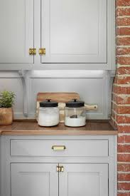Paint colors featured on hgtv show fixer upper. Tranquil And Timeless Tudor Design Details From A Serene 1920s Texas Cottage Hello Lovely Country Kitchen Designs Kitchen Design Farmhouse Dining Room Lighting