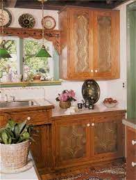 The punched tin panels served as a means of circulating air and adding a decorative flair. Punched Tin Cupboard Doors I Would Only Do On The Top Not This Punching Style Though Tin Interior Punched Tin Tin Kitchen