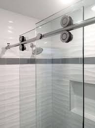 They are good choices for bathrooms with limited room because you can place the shower head in the corner of a small bathroom and enclose it with a custom glass wall. Frameless Sliding Shower Doors And Enclosures