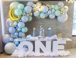 1st Birthday Theme Ideas For Boy Holy Moly Your Little Bundle Of Joy Is Turning 1 Talk About A Milestone Now It Birthday Balloon Decorations Baby Birthday Balloon Birthday Party Decorations