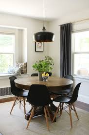 Black And Dark Wood Dining Room Black Pendant Light Dark Gray Curtains Round Dining Table Modern Round Dining Room Beautiful Dining Rooms