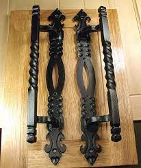 Form meets function with our sturdy and stylish door handles and door pulls. Large Twisted Iron Door Pull Solid Forged Steel Tuscan Style Black Dark Bronze Or Black Powder Coat Finish Iron Doors Barn Door Handles Barn Doors Sliding