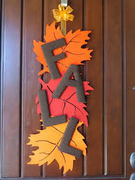 Making a door hanging decorations. 20 Awesome Diy Fall Door Decorations Hative