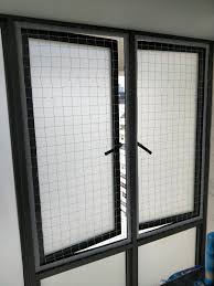 There are mesh guards like this one but i'm not sure if a cat would be able to claw the mesh into shreds. Cat Safety Nets And Mesh For Windows And Gates The Cat People Sg