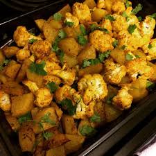 Oven Roasted Aloo Gobi A Recipe Aloo Gobi Recipes Indian Cauliflower Recipes