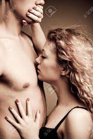 Young Woman Closing Mouth Of Her Partner And Biting His Nipple Stock Photo,  Picture and Royalty Free Image. Image 136302244.