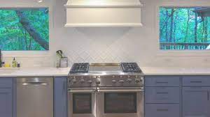White and gray kitchen with black hardware images png logo. The Best Knobs And Pulls For Your Blue Cabinets Trubuild Construction