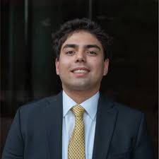 A group project in MKT 302 led five W. P. Carey students to develop a  prototype for a Dunkin' ATM/donut vending machine. Their impressive show of  collaboration and skill was recognized by