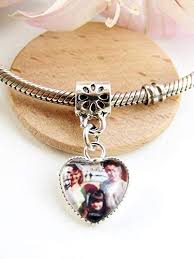 The company manufactures a range of jewelry components including beads, charms, pendants and a variety of clasps and toggles. Photo Charm For Charm Bracelets Personlaised Image Gift Family Picture Custom Charm Baby Scan Memory Charm Loved One Gift Buy Online In Bahamas At Bahamas Desertcart Com Productid 105176997